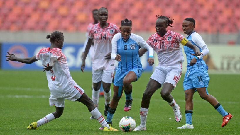 Lone Gaofetoge of Botswana is challenged by Dorka Lokeri Lam and Amy Lasu of South Sudan during the 2021 COSAFA Womens Championship Group B game between Botswana and South Sudan at Nelson Mandela Bay Stadium in Gqeberha on 29 September 2021 ©Ryan Wilkisky/BackpagePix